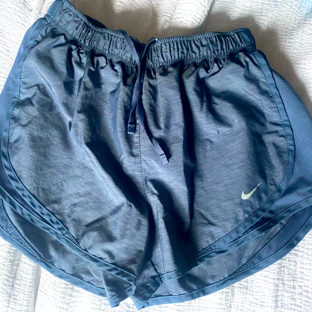 Blue Nike running shorts. Size small.
